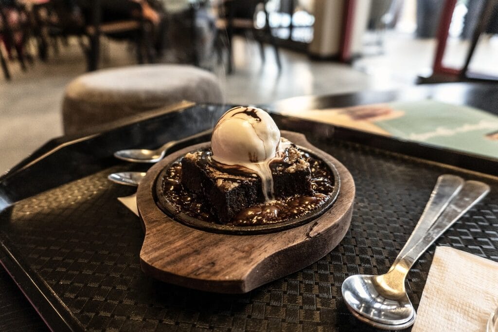 a brownie with ice cream on top of it